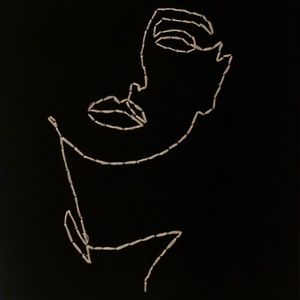 HAND MADE line art embroidery on canvas.